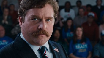 Movie still from “The Campaign” (2012), directed by Jay Roach – A person wearing a suit and tie; Close Up shot, Low angle