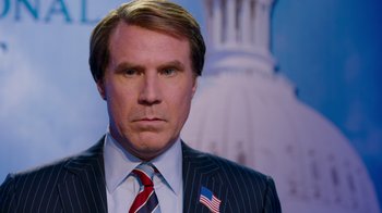 Movie still from “The Campaign” (2012), directed by Jay Roach – A person wearing a suit and tie; Close Up shot, Low angle