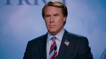 Movie still from “The Campaign” (2012), directed by Jay Roach – A person wearing a suit and tie; Close Up shot, Low angle