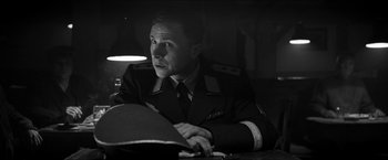 Movie still from “The Captain” (2017), directed by Robert Schwentke – A black and white photo of a man in a military uniform; Close Up shot, Low angle