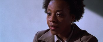 Movie still from “The Cell” (2000), directed by Tarsem Singh – A person wearing a jacket; Close Up shot, Low angle