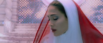 Movie still from “The Cell” (2000), directed by Tarsem Singh – A person wearing a veil; Close Up shot, Low angle