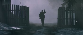 Movie still from “The Chorus” (2004), directed by Christophe Barratier – A man walking in the fog on a foggy day; Wide shot, Low angle