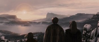 Movie still from “The Chronicles of Narnia: The Lion, the Witch and the Wardrobe” (2005), directed by Andrew Adamson – A group of people standing on top of a hill; Wide shot, Low angle