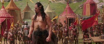 Movie still from “The Chronicles of Narnia: The Lion, the Witch and the Wardrobe” (2005), directed by Andrew Adamson – A man that is standing in front of a crowd; Medium shot, High angle