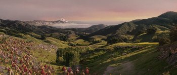 Movie still from “The Chronicles of Narnia: The Lion, the Witch and the Wardrobe” (2005), directed by Andrew Adamson – A view of a valley with a castle in the background; Extreme Wide shot, High angle