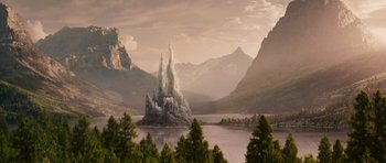 Movie still from “The Chronicles of Narnia: The Lion, the Witch and the Wardrobe” (2005), directed by Andrew Adamson – A painting of a mountain with a lake in the background; Extreme Wide shot, High angle