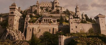 Movie still from “The Chronicles of Narnia: The Lion, the Witch and the Wardrobe” (2005), directed by Andrew Adamson – A castle like building on top of a hill; Extreme Wide shot, High angle