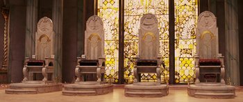 Movie still from “The Chronicles of Narnia: The Lion, the Witch and the Wardrobe” (2005), directed by Andrew Adamson – A pair of chairs in front of a stained glass window; Wide shot, Low angle
