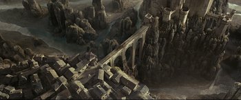 Movie still from “The Chronicles of Narnia: Prince Caspian” (2008), directed by Andrew Adamson – An aerial view of a bridge and a city; Extreme Wide shot, Overhead angle