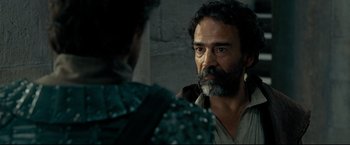 Movie still from “The Chronicles of Narnia: Prince Caspian” (2008), directed by Andrew Adamson – A man with long hair and a beard looking at another man with long hair and a beard; Close Up shot, Over the shoulder angle