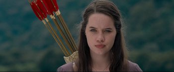 Movie still from “The Chronicles of Narnia: Prince Caspian” (2008), directed by Andrew Adamson – A young woman holding a bow and arrow; Close Up shot, High angle