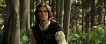 Movie still from “The Chronicles of Narnia: Prince Caspian” (2008), directed by Andrew Adamson – A man with long brown hair wearing a brown vest; Close Up shot, Low angle