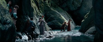 Movie still from “The Chronicles of Narnia: Prince Caspian” (2008), directed by Andrew Adamson – A group of people walking across a river; Wide shot, High angle