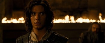 Movie still from “The Chronicles of Narnia: Prince Caspian” (2008), directed by Andrew Adamson – A person with long brown hair; Close Up shot, Over the shoulder angle