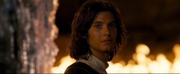 Movie still from “The Chronicles of Narnia: Prince Caspian” (2008), directed by Andrew Adamson – A person with long brown hair; Close Up shot, Over the shoulder angle
