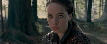 Movie still from “The Chronicles of Narnia: Prince Caspian” (2008), directed by Andrew Adamson – A person wearing a chain mail jacket; Close Up shot, Over the shoulder angle