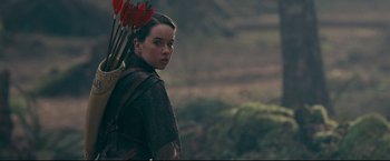 Movie still from “The Chronicles of Narnia: Prince Caspian” (2008), directed by Andrew Adamson – A young woman holding a bow and arrow; Medium shot, Over the shoulder angle