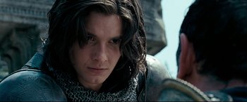 Movie still from “The Chronicles of Narnia: Prince Caspian” (2008), directed by Andrew Adamson – A person wearing a chain mail jacket; Close Up shot, Low angle