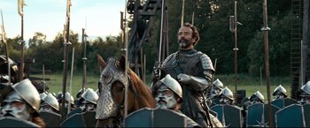 Movie still from “The Chronicles of Narnia: Prince Caspian” (2008), directed by Andrew Adamson – A man in a suit of armor on a horse; Medium shot, Low angle