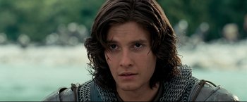 Movie still from “The Chronicles of Narnia: Prince Caspian” (2008), directed by Andrew Adamson – A person with long brown hair; Close Up shot, Over the shoulder angle