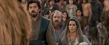 Movie still from “The Chronicles of Narnia: Prince Caspian” (2008), directed by Andrew Adamson – A group of people standing next to each other in front of a crowd of onlookers; Close Up shot, Over the shoulder angle