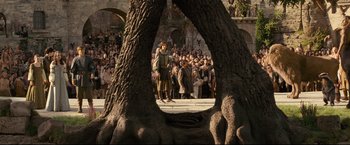Movie still from “The Chronicles of Narnia: Prince Caspian” (2008), directed by Andrew Adamson – A crowd of people standing around a tree; Wide shot, Low angle