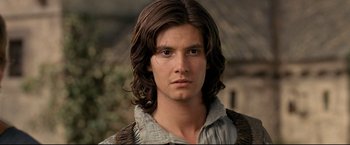 Movie still from “The Chronicles of Narnia: Prince Caspian” (2008), directed by Andrew Adamson – A man with long brown hair wearing a brown shirt; Close Up shot, High angle