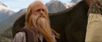 Movie still from “The Chronicles of Narnia: Prince Caspian” (2008), directed by Andrew Adamson – A man with long hair and a long beard; Close Up shot, Over the shoulder angle