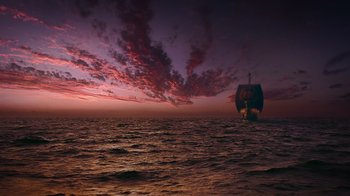 Movie still from “The Chronicles of Narnia: The Voyage of the Dawn Treader” (2010), directed by Michael Apted – A boat in the middle of the ocean under a cloudy sky; Extreme Wide shot, Low angle
