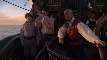 Movie still from “The Chronicles of Narnia: The Voyage of the Dawn Treader” (2010), directed by Michael Apted – A group of men standing next to each other on top of a boat; Medium shot, Low angle