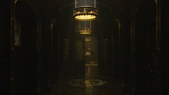 Movie still from “The Chronicles of Narnia: The Voyage of the Dawn Treader” (2010), directed by Michael Apted – A light shines in a dark room with a floor; Extreme Wide shot, High angle