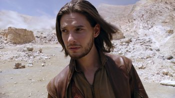 Movie still from “The Chronicles of Narnia: The Voyage of the Dawn Treader” (2010), directed by Michael Apted – A person with long brown hair; Close Up shot, Over the shoulder angle