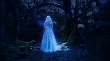 Movie still from “The Chronicles of Narnia: The Voyage of the Dawn Treader” (2010), directed by Michael Apted – A woman in a white dress standing in the woods; Wide shot, High angle