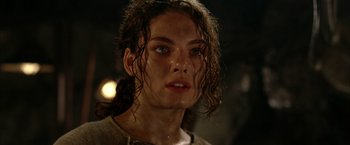 Movie still from “The Chronicles of Riddick” (2004), directed by David Twohy – A person with wet hair; Close Up shot, Low angle