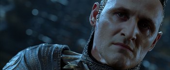 Movie still from “The Chronicles of Riddick” (2004), directed by David Twohy – A person wearing a chain mail outfit; Close Up shot, Low angle