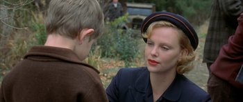Movie still from “The Cider House Rules” (1999), directed by Lasse Hallström – A woman and a boy talking to each other outside; Close Up shot, Over the shoulder angle