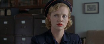 Movie still from “The Cider House Rules” (1999), directed by Lasse Hallström – A person wearing a hat; Close Up shot, Over the shoulder angle