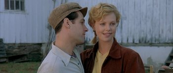 Movie still from “The Cider House Rules” (1999), directed by Lasse Hallström – A man and a woman standing next to each other; Close Up shot, Over the shoulder angle