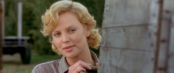 Movie still from “The Cider House Rules” (1999), directed by Lasse Hallström – Charlize theron in the movie young adult; Close Up shot, Over the shoulder angle