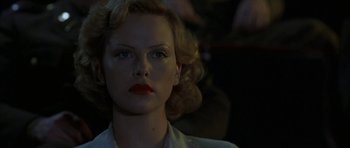 Movie still from “The Cider House Rules” (1999), directed by Lasse Hallström – A person wearing a white shirt and red lipstick; Close Up shot, Low angle