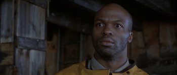 Movie still from “The Cider House Rules” (1999), directed by Lasse Hallström – A man with a surprised look on his face; Close Up shot, Low angle