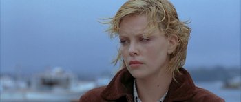 Movie still from “The Cider House Rules” (1999), directed by Lasse Hallström – Charlize theron's head and shoulders; Close Up shot, Low angle