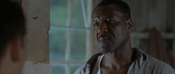 Movie still from “The Cider House Rules” (1999), directed by Lasse Hallström – A person wearing a shirt; Close Up shot, Low angle