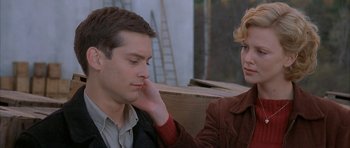Movie still from “The Cider House Rules” (1999), directed by Lasse Hallström – A man and a woman sitting next to each other on a bench; Close Up shot, Over the shoulder angle