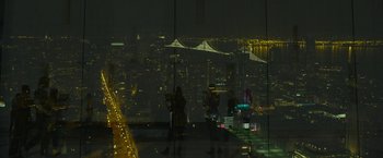 Movie still from “The Circle” (2017), directed by James Ponsoldt – A view of a city at night from a skyscraper; Extreme Wide shot, High angle