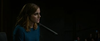 Movie still from “The Circle” (2017), directed by James Ponsoldt – A person looking to the side; Close Up shot, Over the shoulder angle