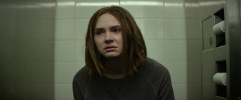 Movie still from “The Circle” (2017), directed by James Ponsoldt – A woman with long hair is looking at the camera; Close Up shot, Over the shoulder angle