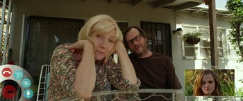 Movie still from “The Circle” (2017), directed by James Ponsoldt – A man and a woman sitting next to each other; Close Up shot, Low angle