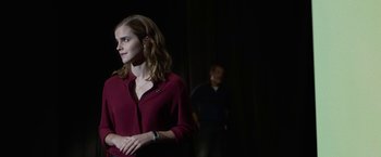 Movie still from “The Circle” (2017), directed by James Ponsoldt – A woman in a red shirt standing next to a man in a blue shirt; Medium shot, Low angle